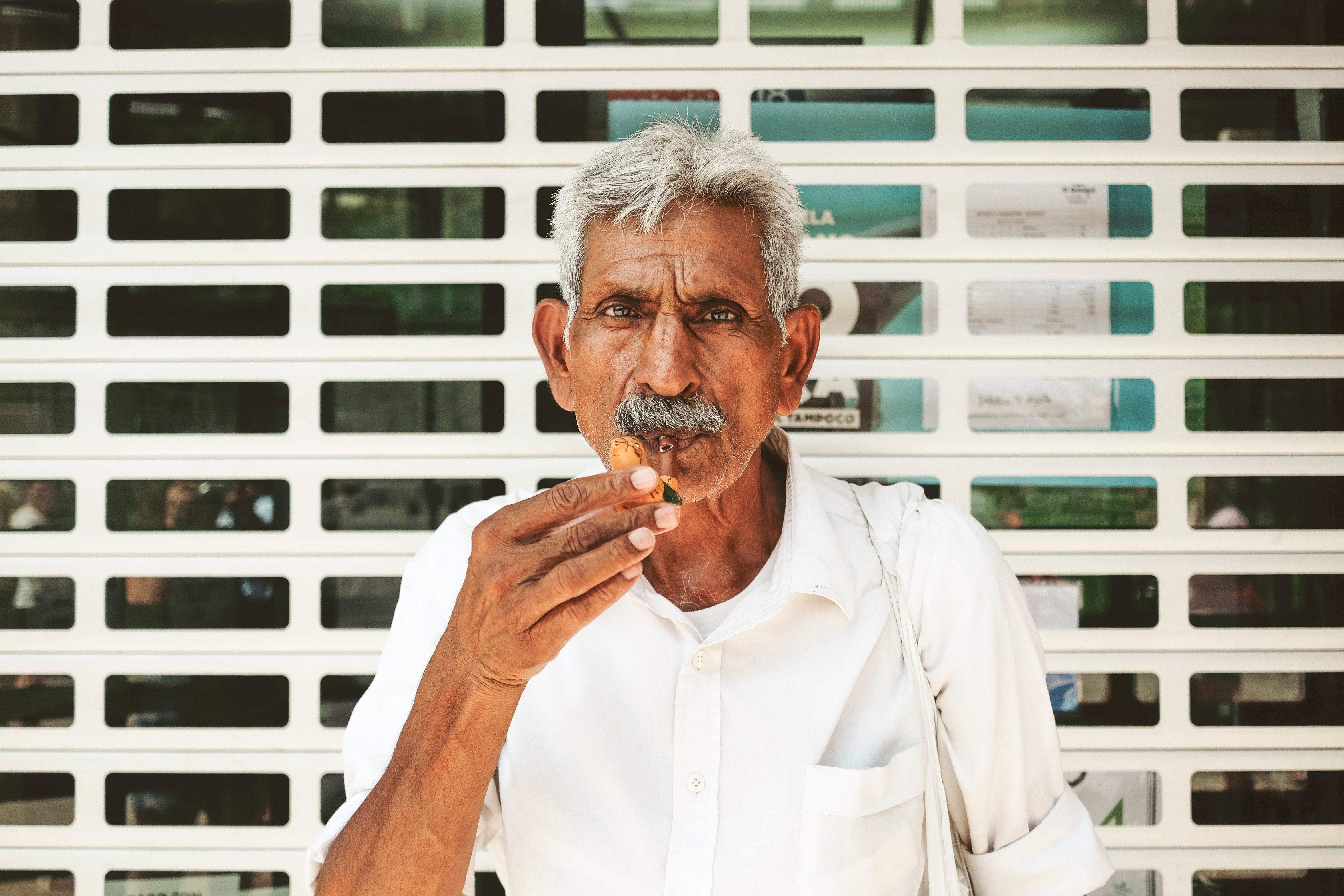 man touching his chin